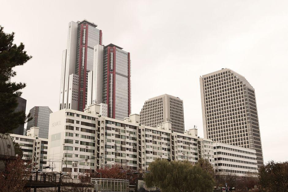 Tall Buildings Surrounded by Trees